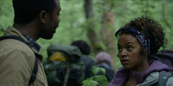 Movie still from “Blair Witch” (2016), directed by Adam Wingard – A man and a woman are talking in the woods; Close Up shot, Over the shoulder angle