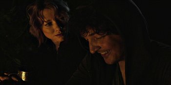Movie still from “Blair Witch” (2016), directed by Adam Wingard – A man and a woman looking at each other in the dark; Close Up shot, Over the shoulder angle