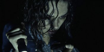 Movie still from “Blair Witch” (2016), directed by Adam Wingard – A person with curly hair; Close Up shot, Overhead angle