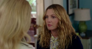 Movie still from “Blended” (2014), directed by Frank Coraci – A woman with long blonde hair talking to another woman; Close Up shot, Over the shoulder angle