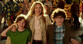 Movie still from “Blended” (2014), directed by Frank Coraci – A woman standing next to two young boys; Medium shot, Over the shoulder angle