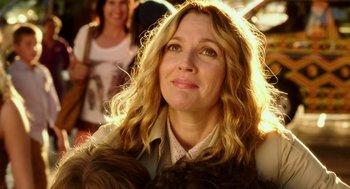 Movie still from “Blended” (2014), directed by Frank Coraci – A person wearing a jacket; Close Up shot, Low angle