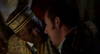 Movie still from “Blended” (2014), directed by Frank Coraci – A man and an older man are talking to each other; Close Up shot, Over the shoulder angle