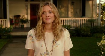 Movie still from “Blended” (2014), directed by Frank Coraci – A woman with long blonde hair wearing a white shirt; Close Up shot, Over the shoulder angle