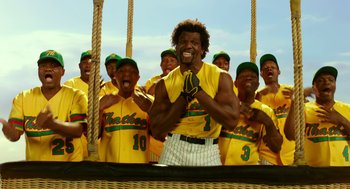 Movie still from “Blended” (2014), directed by Frank Coraci – A group of baseball players standing next to each other; Medium shot, Low angle