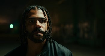 Movie still from “Blindspotting” (2018), directed by Carlos López Estrada – A person with a beard; Close Up shot, Low angle