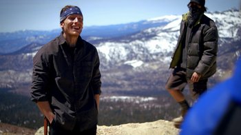 Movie still from “Blue Jay” (2016), directed by Alex Lehmann – A man standing on top of a mountain next to another man; Medium shot, Over the shoulder angle