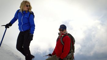 Movie still from “Blue Jay” (2016), directed by Alex Lehmann – A man and a woman standing next to each other on top of a mountain; Wide shot, Low angle