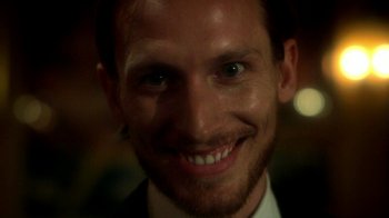 Movie still from “Blue Jay” (2016), directed by Alex Lehmann – A person smiling for the camera; Extreme Close Up shot, Low angle