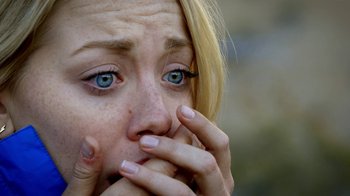 Movie still from “Blue Jay” (2016), directed by Alex Lehmann – A person holding their hands to their face; Extreme Close Up shot, High angle