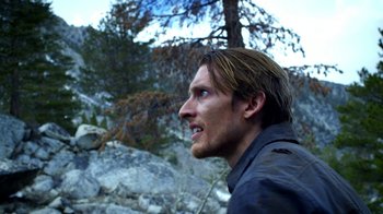 Movie still from “Blue Jay” (2016), directed by Alex Lehmann – A person with a jacket on; Close Up shot, Low angle