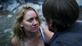 Movie still from “Blue Jay” (2016), directed by Alex Lehmann – A woman looking at a man who is touching her face; Close Up shot, Over the shoulder angle