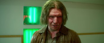 Movie still from “Border” (2018), directed by Ali Abbasi – A person with long hair; Close Up shot, Low angle