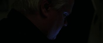 Movie still from “Border” (2018), directed by Ali Abbasi – A person's face in the dark; Close Up shot, High angle