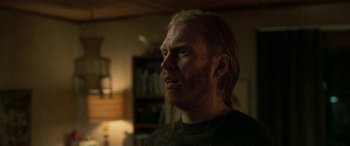 Movie still from “Border” (2018), directed by Ali Abbasi – A person with long hair; Close Up shot, Over the shoulder angle