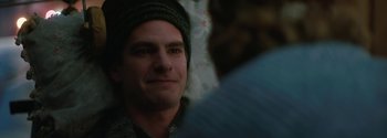Movie still from “Breathe” (2017), directed by Andy Serkis – A person wearing a hat; Close Up shot, Over the shoulder angle