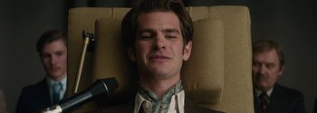 Movie still from “Breathe” (2017), directed by Andy Serkis – A person wearing a suit and tie; Close Up shot, Low angle