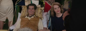 Movie still from “Breathe” (2017), directed by Andy Serkis – A man and a woman sitting next to each other; Medium shot, High angle