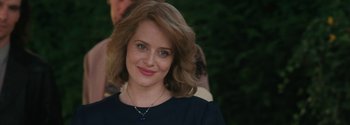 Movie still from “Breathe” (2017), directed by Andy Serkis – A person wearing a necklace; Close Up shot, Over the shoulder angle