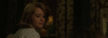 Movie still from “Breathe” (2017), directed by Andy Serkis – A person wearing a white shirt; Close Up shot, Over the shoulder angle