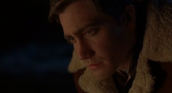 Movie still from “Brokeback Mountain” (2005), directed by Ang Lee – A person wearing a jacket; Close Up shot, Over the shoulder angle