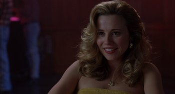 Movie still from “Brokeback Mountain” (2005), directed by Ang Lee – A beautiful woman with blonde hair wearing a yellow top; Close Up shot, Over the shoulder angle