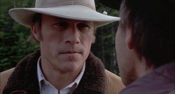 Movie still from “Brokeback Mountain” (2005), directed by Ang Lee – A person wearing a cowboy hat; Close Up shot, Over the shoulder angle