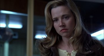 Movie still from “Brokeback Mountain” (2005), directed by Ang Lee – A person with long blonde hair; Close Up shot, Over the shoulder angle