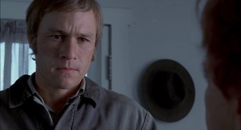 Movie still from “Brokeback Mountain” (2005), directed by Ang Lee – A person wearing a shirt; Close Up shot, High angle