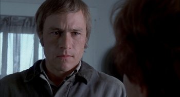 Movie still from “Brokeback Mountain” (2005), directed by Ang Lee – A person looking at the camera; Close Up shot, Over the shoulder angle