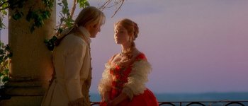 Movie still from “Brotherhood of the Wolf” (2001), directed by Christophe Gans – A man and a woman dressed in renaissance clothing; Medium shot, Over the shoulder angle