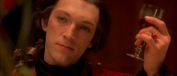 Movie still from “Brotherhood of the Wolf” (2001), directed by Christophe Gans – A man with long hair; Close Up shot, High angle