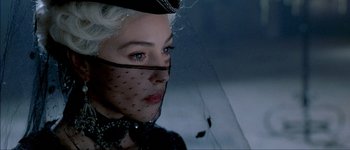 Movie still from “Brotherhood of the Wolf” (2001), directed by Christophe Gans – A person wearing a veil; Close Up shot, Over the shoulder angle