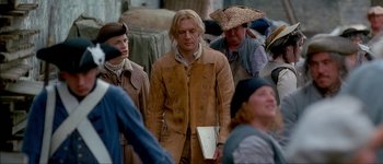 Movie still from “Brotherhood of the Wolf” (2001), directed by Christophe Gans – A group of people standing next to each other; Medium shot, Over the shoulder angle