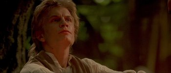 Movie still from “Brotherhood of the Wolf” (2001), directed by Christophe Gans – A person wearing a white shirt; Close Up shot, Low angle