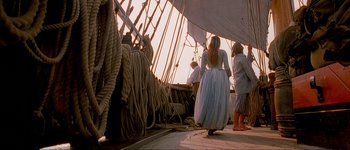 Movie still from “Brotherhood of the Wolf” (2001), directed by Christophe Gans – A group of people standing next to a boat; Wide shot, High angle