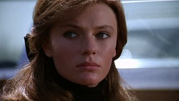 Movie still from “Bullitt” (1968), directed by Peter Yates – A person with long hair; Close Up shot, Low angle