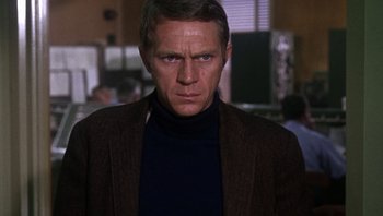Movie still from “Bullitt” (1968), directed by Peter Yates – A person wearing a jacket; Close Up shot, Low angle