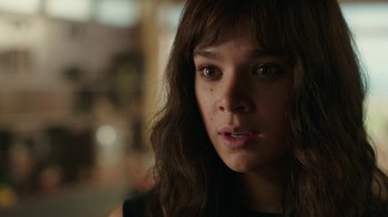 Movie still from “Bumblebee” (2018), directed by Travis Knight – A person with long brown hair; Close Up shot, Over the shoulder angle