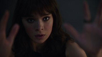 Movie still from “Bumblebee” (2018), directed by Travis Knight – A woman's face in the dark; Close Up shot, Over the shoulder angle