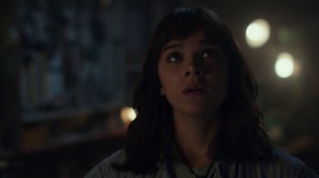 Movie still from “Bumblebee” (2018), directed by Travis Knight – A woman looking up at the ceiling in a dark room; Close Up shot, Low angle