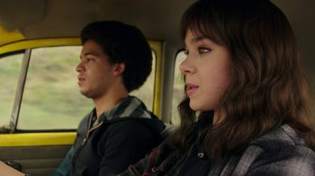 Movie still from “Bumblebee” (2018), directed by Travis Knight – A man and a woman sitting in the back of a car; Close Up shot, Over the shoulder angle