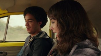 Movie still from “Bumblebee” (2018), directed by Travis Knight – A young man and a young woman sitting in a car; Close Up shot, Over the shoulder angle