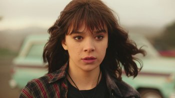 Movie still from “Bumblebee” (2018), directed by Travis Knight – A person wearing a plaid shirt; Close Up shot, High angle
