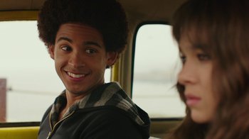 Movie still from “Bumblebee” (2018), directed by Travis Knight – A man and a woman sitting in the back of a car; Close Up shot, Over the shoulder angle