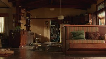 Movie still from “Bumblebee” (2018), directed by Travis Knight – A room that has a bed in it; Wide shot, High angle