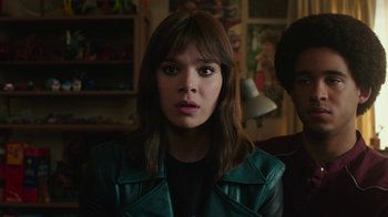 Movie still from “Bumblebee” (2018), directed by Travis Knight – A young woman in a leather jacket looking at the camera; Close Up shot, Low angle