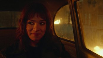 Movie still from “Bumblebee” (2018), directed by Travis Knight – A person sitting in a car; Close Up shot, Over the shoulder angle