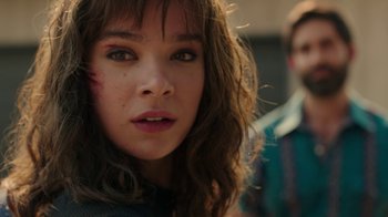 Movie still from “Bumblebee” (2018), directed by Travis Knight – A person with long brown hair; Close Up shot, Over the shoulder angle