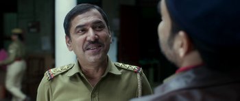 Movie still from “Bunty Aur Babli 2” (2021), directed by Varun V. Sharma – A person talking to another person; Close Up shot, Over the shoulder angle